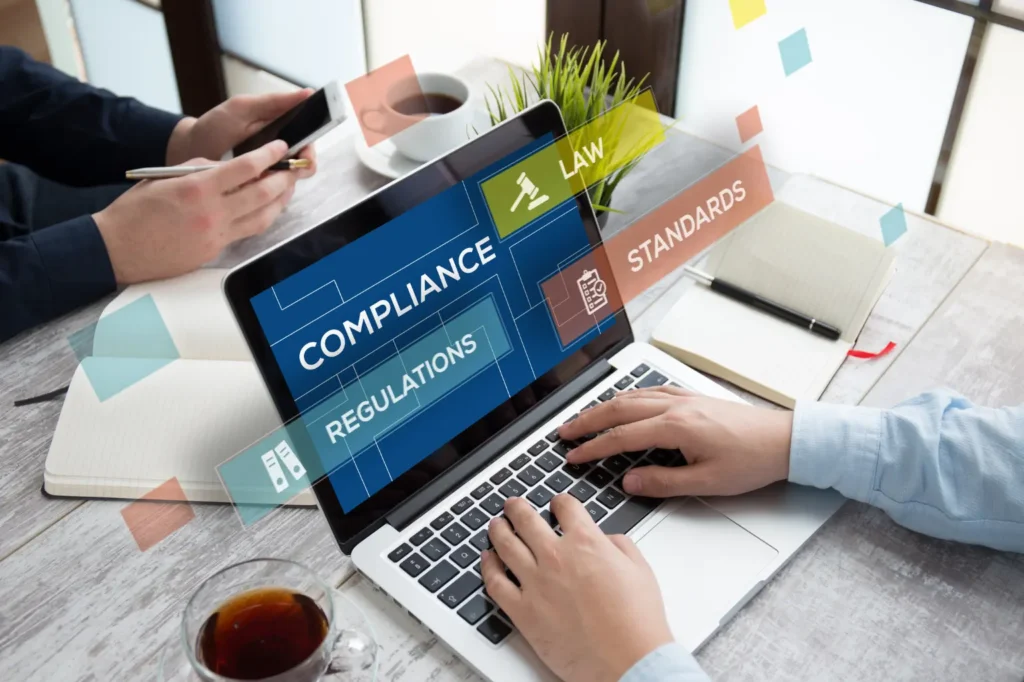 compliance regulations on a laptop