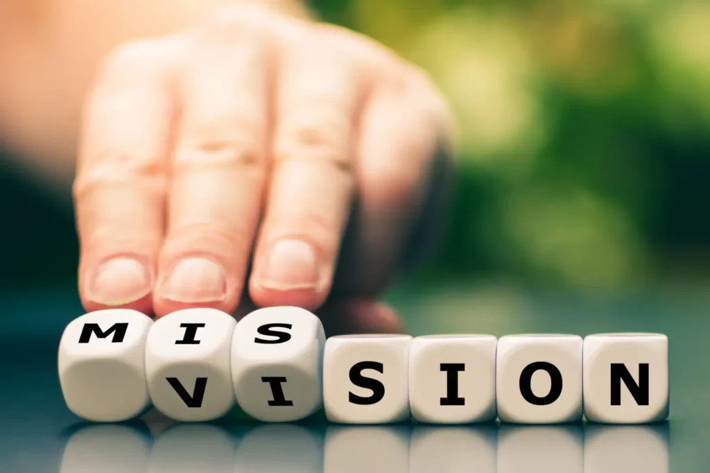 cubes with the word mission