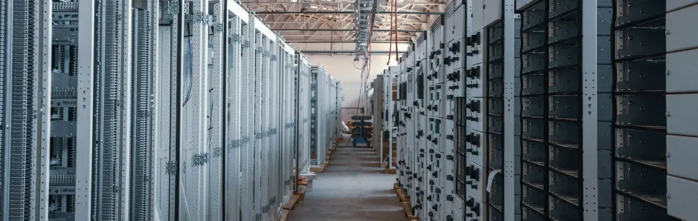 Interior of a data center with rows of server racks