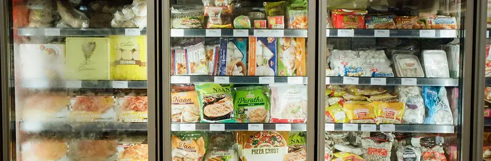 Close-up of a refrigerant unit inside a supermarket grocery store