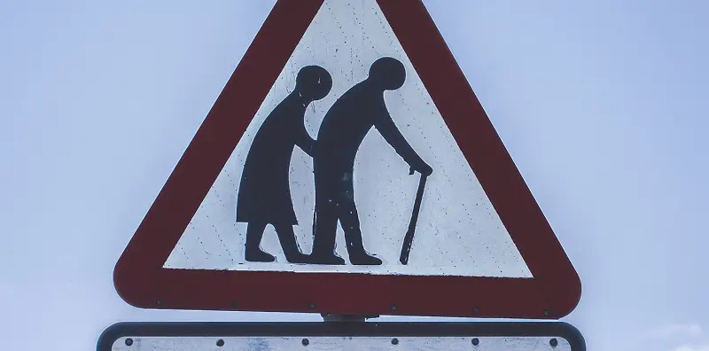Road Sign showing elderly people crossing